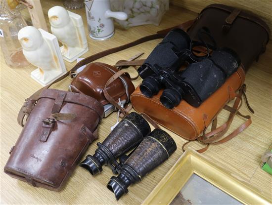 An Afga camera and three pairs of binoculars